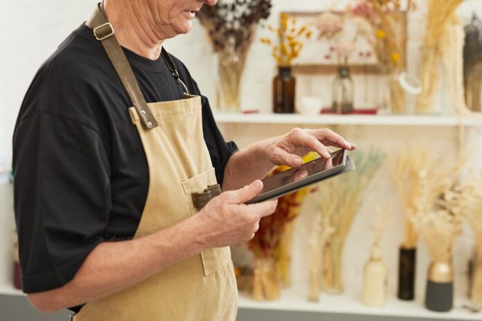 Adult Man Working in Flower Shop